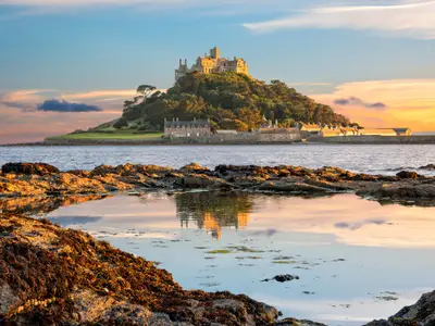 Penzance, Cornwall, United Kingdom - August 9, 2016: View of St Michael's Mount in Cornwall at sunset
