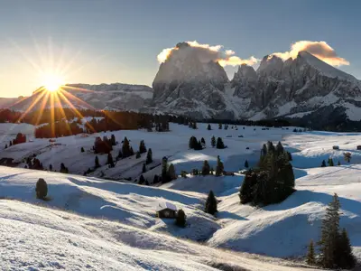 Picturesque sunrise panoramic view on Odle - Geisler mountain group, Seceda and Seiser Alm (Alpe di Siusi). Beautiful morning autumn scenery in the Dolomite Alps, South Tyrol, Italy.