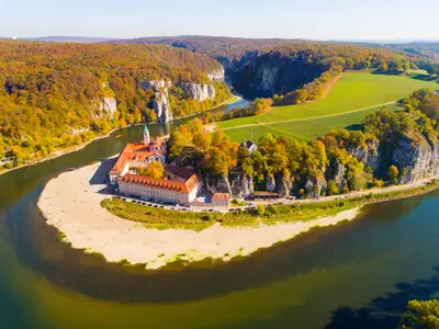 Aerial view to Weltenburg Abbey - Kloster Weltenburg. This landmark is a Benedictine monastery in Weltenburg in Kelheim on the Danube in Bavaria, Germany.