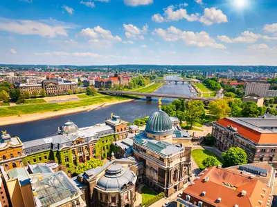 View from Church of Our Lady (Frauenkirche) of the Elbe river and Dresden town. Sunny spring scene in Saxony, Germany, Europe. Artistic style post processed photo.