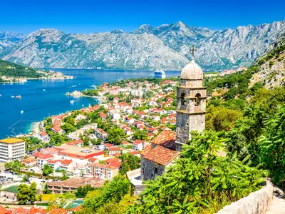 Kotor, Montenegro. Bay of Kotor bay is one of the most beautiful places on Adriatic Sea, it boasts the preserved Venetian fortress, old tiny villages, medieval towns and scenic mountains.