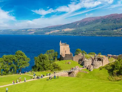 Urquhart Castle along Loch Ness lake in Scotland in a beautiful summer day, United Kingdom