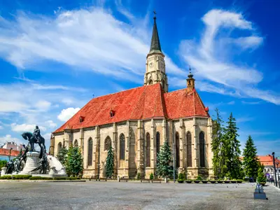 Cluj, Romania. Medieval St. Michael's Church and Union Square in Cluj-Napoca, Transylvania.