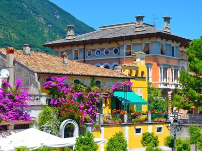 Beautiful spring view of Limone sul Garda, buildings in flowers. Limone sul Garda, famous region of Lombardy, Italy