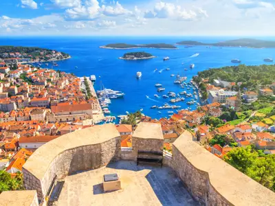 Coastal summer landscape - top view of the City Harbour and marina of the town of Hvar from the fortress, on the island of Hvar, the Adriatic coast of Croatia