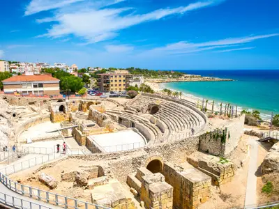 Historic site of an ancient Roman amphitheater near the Mediterranean coast in Tarragona, Spain