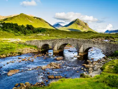 Old vintage brick bridge crossing river in Sligachan - Isle of Skye