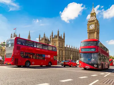 Big Ben, Westminster Bridge and red double decker bus in London, England, United Kingdom