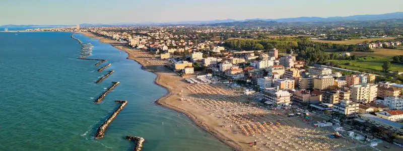 Aerial view of Torre Pedrera Beach from drone in summer season, Rimini, Italy.