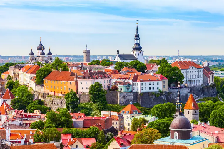 View from tower of Saint Olaf Church on old city of Tallinn and roofs of old houses. Tallinn, Estonia.