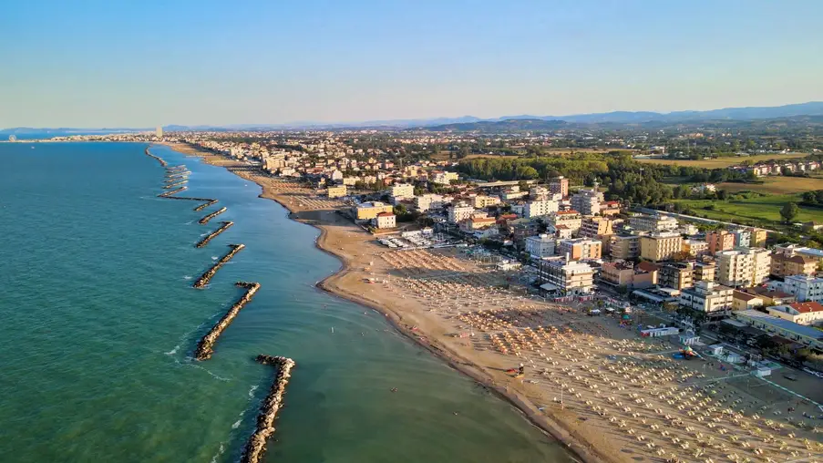 Aerial view of Torre Pedrera Beach from drone in summer season, Rimini, Italy.